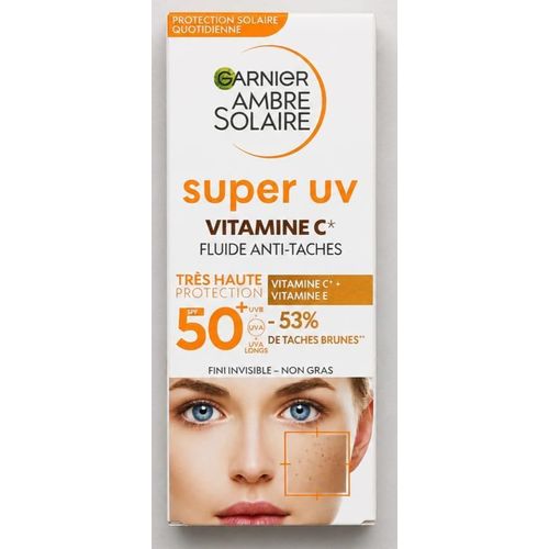 GARNIER Ambre Solaire. Fluide Visage anti-taches SPF 50+ à la VtmnC. 40 ml Importé de France