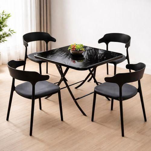 Table pliante vitrée - 4 chaises en plastique