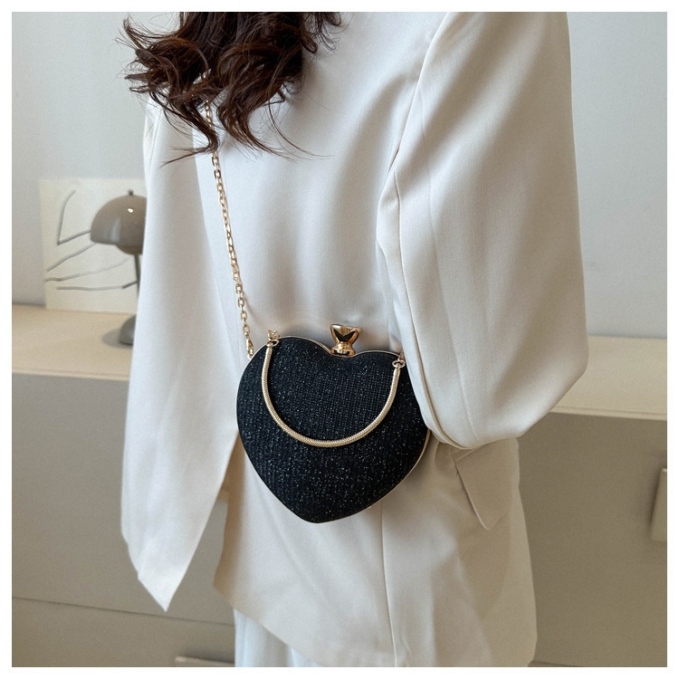 Pochette de dîner à pampilles pour femmes, sac de luxe pour Banquet, robe en métal, polyvalent, en forme de cœur, nouvelle collection