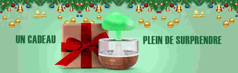 Coffret cadeau avec ruban rouge à côté du pot de pâte à tartiner. Le texte en français suggère un cadeau surprenant. L'arrière-plan comporte une cloche festive et un motif d'ornement