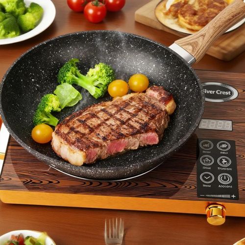 Plaque de cuisson infrarouge générique de 3500 W possède un motif en bois distinctif et un affichage numérique