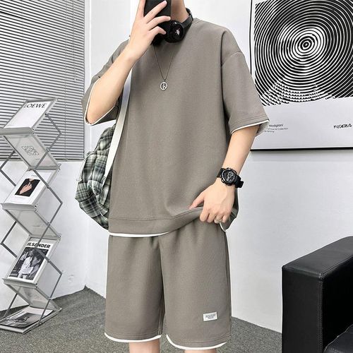 Ensemble short décontracté pour homme, t-shirt à manches courtes et short imprimé tendance à col rond, idéal pour le printemps et l'été.