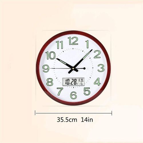 horloge lumineuse dans l'horloge murale murale sombre nuit