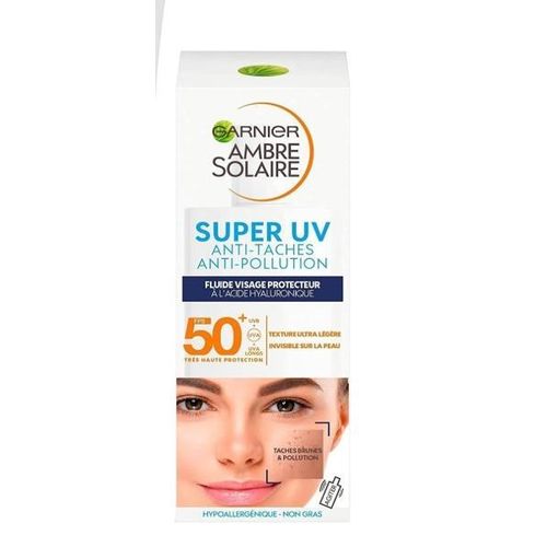 Garnier Ambre Solaire. Fluide FPS 50+ pour le visage. Protège les peaux sensibles des UV. Fluide visage anti-taches & anti-pollution. 40 ml. formule a l'acide hyaluronique et a la Vtmn. E. Peaux sensibles. Importé de France