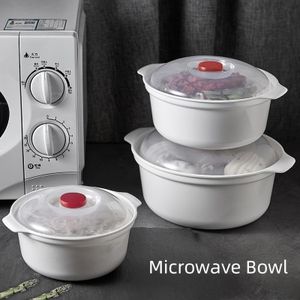 Ensemble de trois bols allant au micro-ondes avec couvercle, sans BPA, idéal pour réchauffer les aliments.