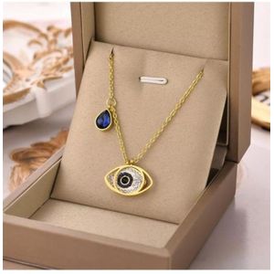 Fashion Forms Chaîne  en acier inoxydable pendantif  œil de Fatima couleur dorée idéal cadeau pour la saint Valentin, anniversaire, baptême, mariage 