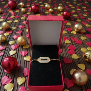 In Gourmette Femme Ovale Cristaux en Acier Inoxydable Doré