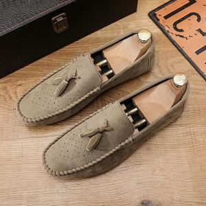 Tod's importé à ponpon pour Homme