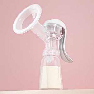 Nouveau format Pompe à lait manuelle avec récipient de collecte et tasse de stockage intégrés. Idéale pour les mères allaitantes