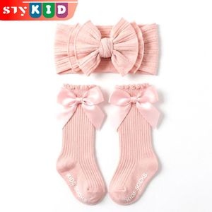 STY Serre-tête et chaussettes enfants 2 en 1 Turban & chaussettes nœud décoration (0-3 ans)