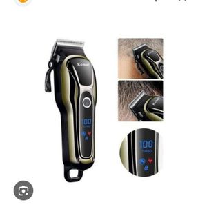 d'une tondeuse à cheveux électrique Kemei noir 