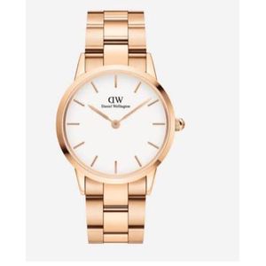 Daniel Wellington Montre de Luxe Mixte – L’Élégance Intemporelle en Or Rose