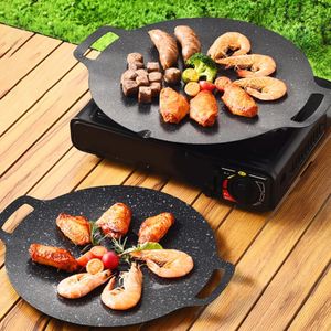 Poêle à griller ronde avec revêtement effet pierre Maifan, compatible avec les plaques de cuisson et l'induction.
