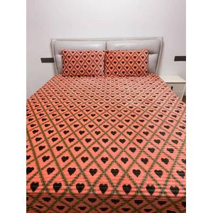 un ensemble de draps de lit (parure de lit)