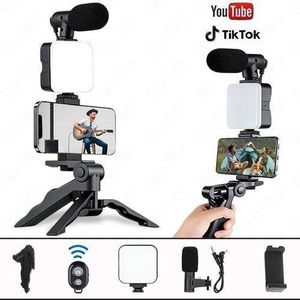 Kit Vlogging Professionnel 4-en-1 – Pack de Streaming pour Smartphone avec Trépied Poignée, Lampe LED, Microphone Canon et Télécommande Bluetooth – Idéal TikTok, YouTube Shorts, Reels et Lives