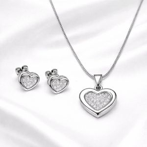 Parure bijoux cœur brillant argenté