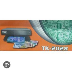 un détecteur de faux billets