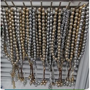 (1)Tasbih (ou Misbaha), un chapelet Musulman 