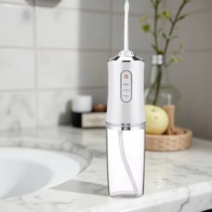 Irrigateur Buccal jet d'eau dentaire électrique - L’essentiel pour une bouche saine, partout